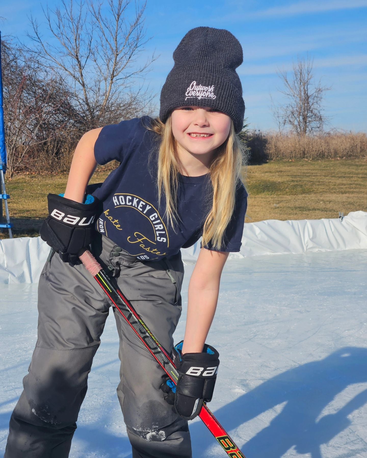 ba_-_growing_up_hockey_-_beanie_and_girl_skate_faster.jpg