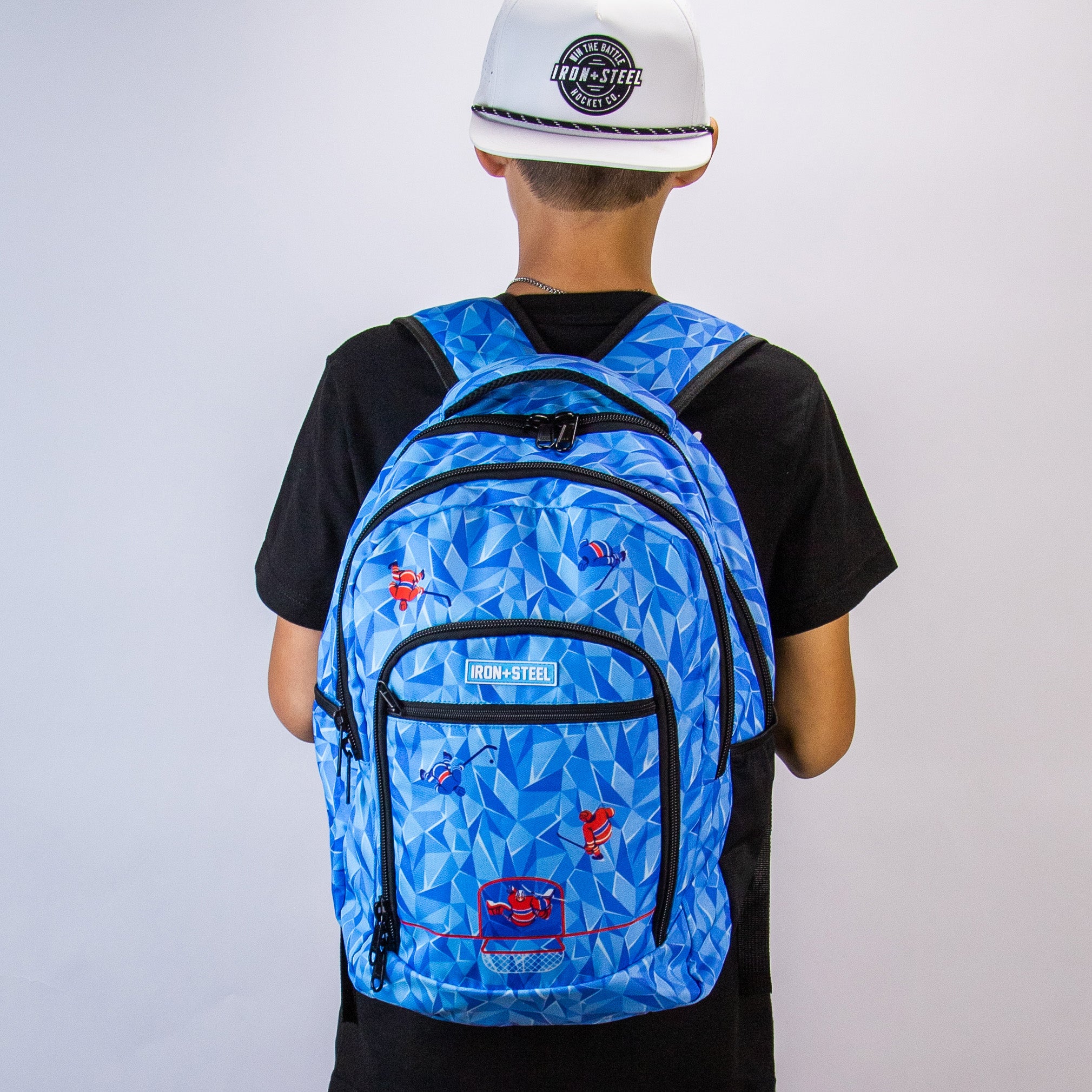 backpack-overhead-blue-back-model-web_3879f890-3587-4b07-9f83-dc32e1f2206e.jpg