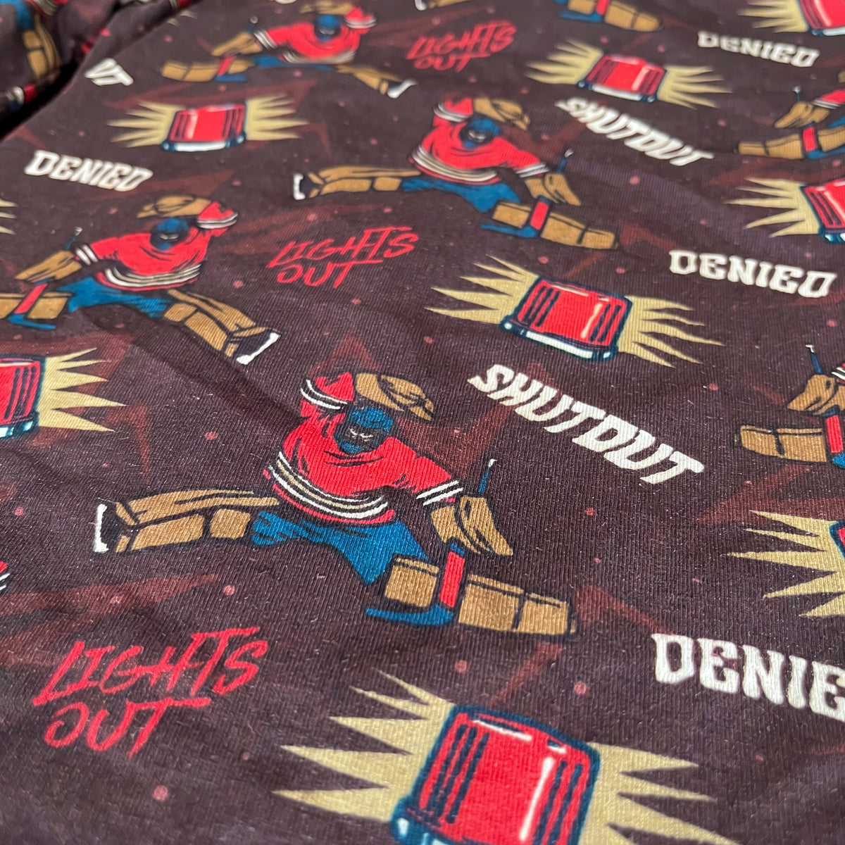 Goalie Lights Out pajama print close up